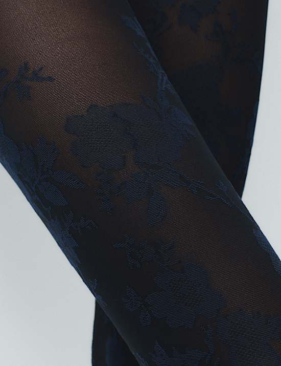 Panty van netstof met bloemen