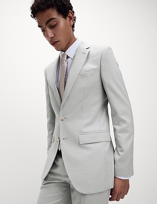 Veste tailleur coupe cintr&eacute;e en tissu extensible