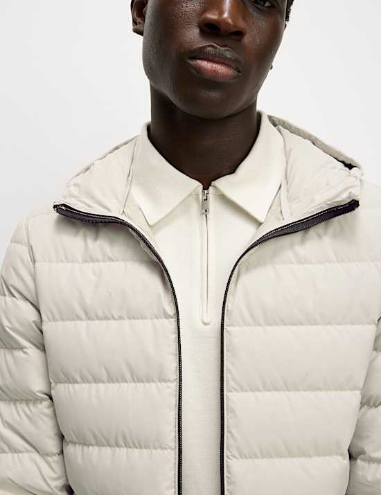 Leichte, gepolsterte Jacke mit Federn und Daunen