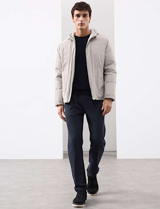 Veste molletonn&eacute;e, garnie de plumes et de duvet