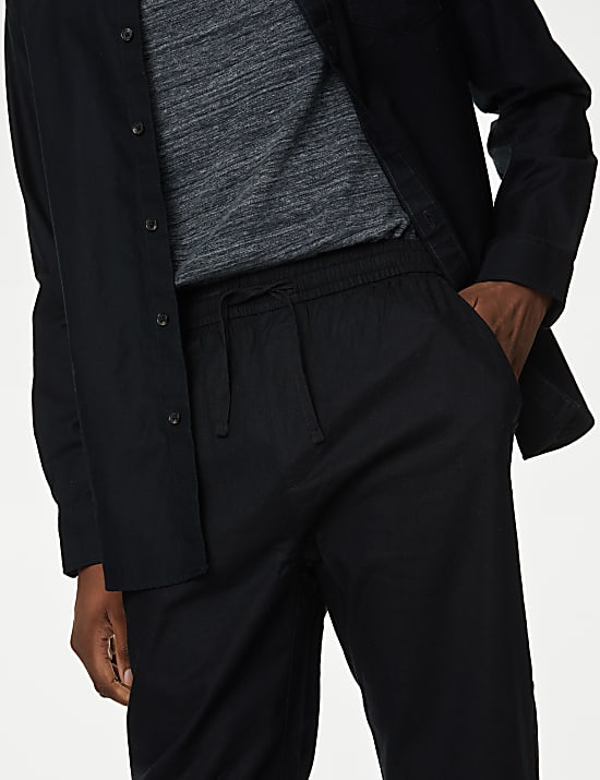 Spodnie o zwężanym kroju z mieszanki lnu