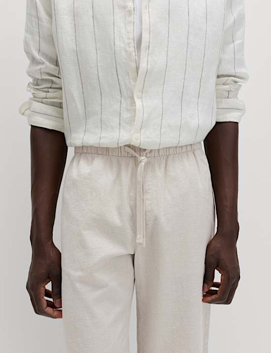 Pantalones con cintura con el&aacute;stico de corte holgado en mezcla de lino