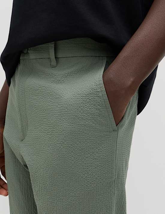 Katoenrijke seersucker broek met taps toelopende pasvorm