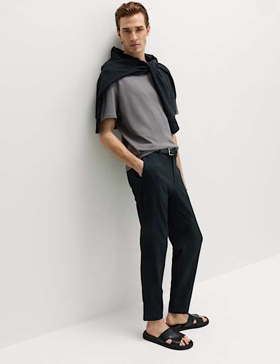 Pantalones tapered de sirsaca de algod&oacute;n