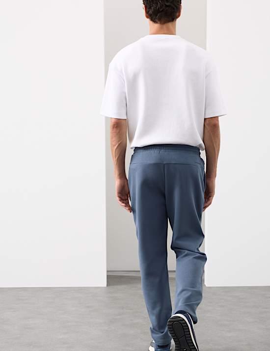 Pantalones deportivos rectos de algod&oacute;n con detalle de nervaduras