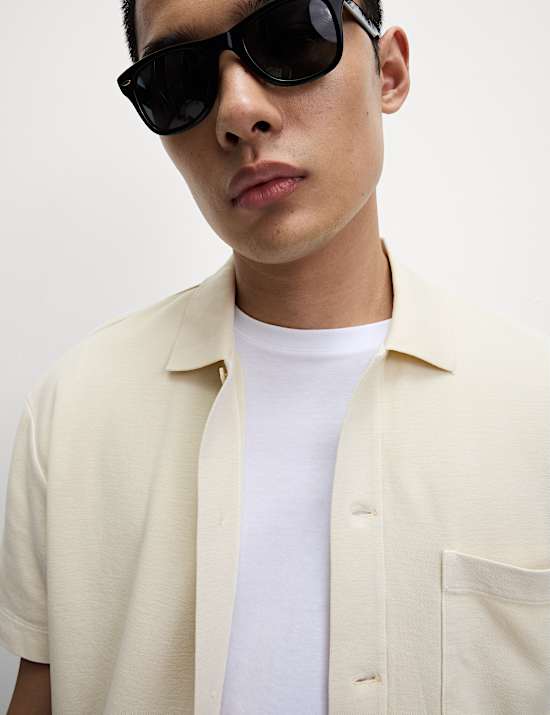 Polo coupe d&eacute;contract&eacute;e 100 % coton textur&eacute;