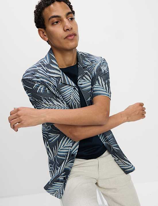 Poloshirt met ingeweven palmbladmotief