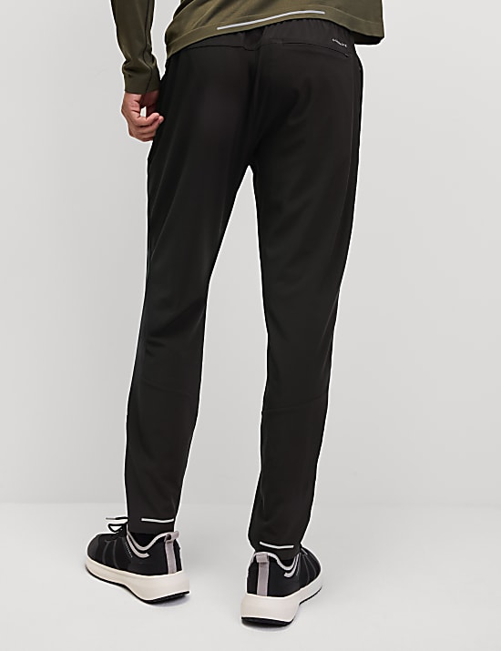 Pantalon de jogging en tissu extensible à poches zippées et cordon