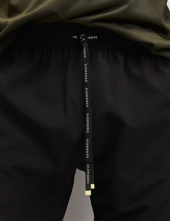 Pantalon de jogging en tissu extensible à poches zippées et cordon