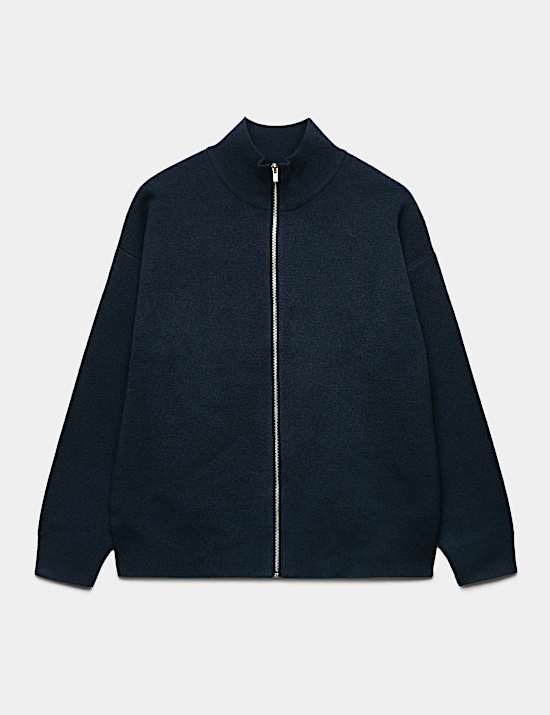 Chaqueta con cremallera y cuello chimenea de corte holgado