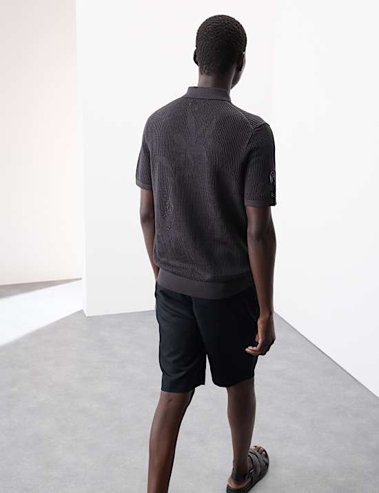 Zuiver katoenen tricot poloshirt met bloemendessin