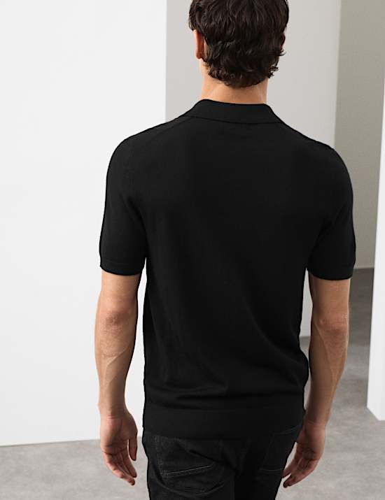 Gebreid poloshirt van extra fijne, zuivere merinowol