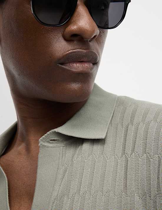 Polo en maille de coton &agrave; motif textur&eacute;