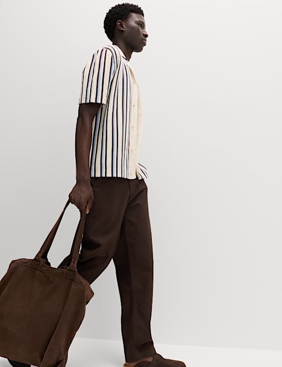 Gestricktes Baumwoll-Poloshirt mit Struktur- und Streifenmuster