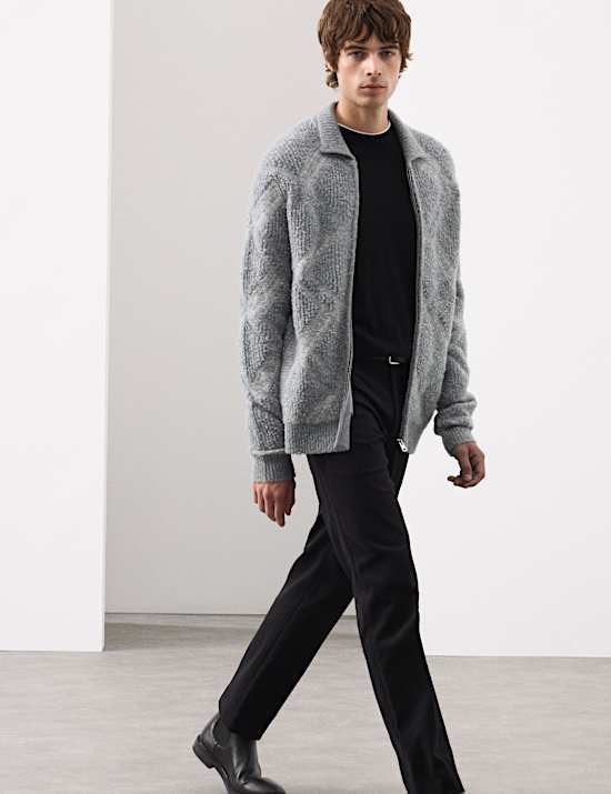 Veste en laine mérinos bouclée avec fermeture zippée