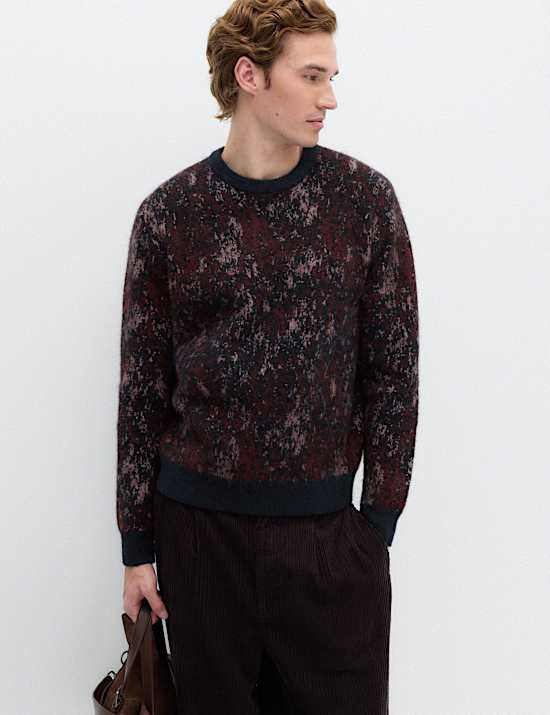 Pull &agrave; col rond et motif &eacute;claboussures de pixels avec laine