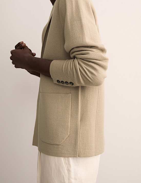 Gebreid jasje van extra fijne, zuivere merinowol