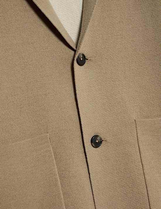 Gebreid jasje van extra fijne, zuivere merinowol