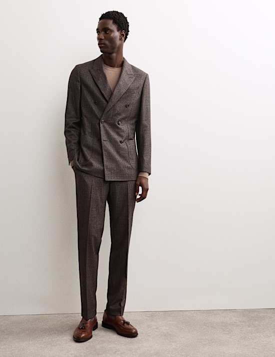 Colbert met dubbele rij knopen en pied-de-poulemotief