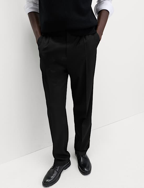 Pantalones de vestir elásticos de corte holgado