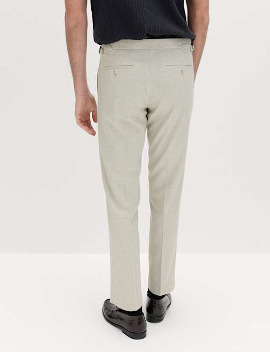 M&iacute;rně z&uacute;žen&eacute; kalhoty se vzorem ryb&iacute; kostry