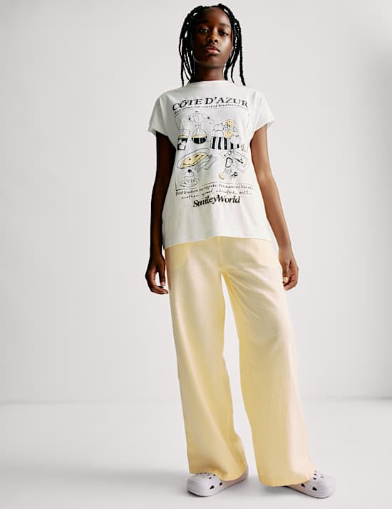 מכנסיים בגזרת רגל רחבה מבד עשיר בפשתן (6-‏16 שנים)