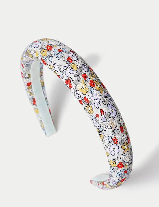 Diadema acolchada de florecillas