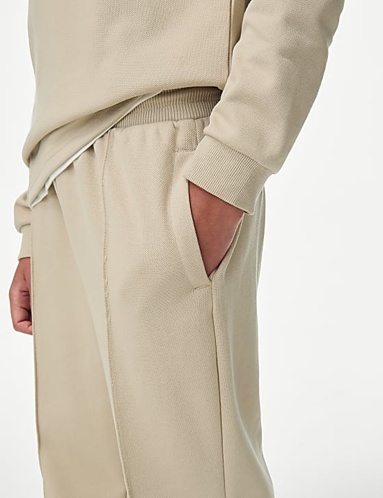 Kalhoty s n&aacute;plety z bavlněn&eacute; směsi (6&ndash;16 let)