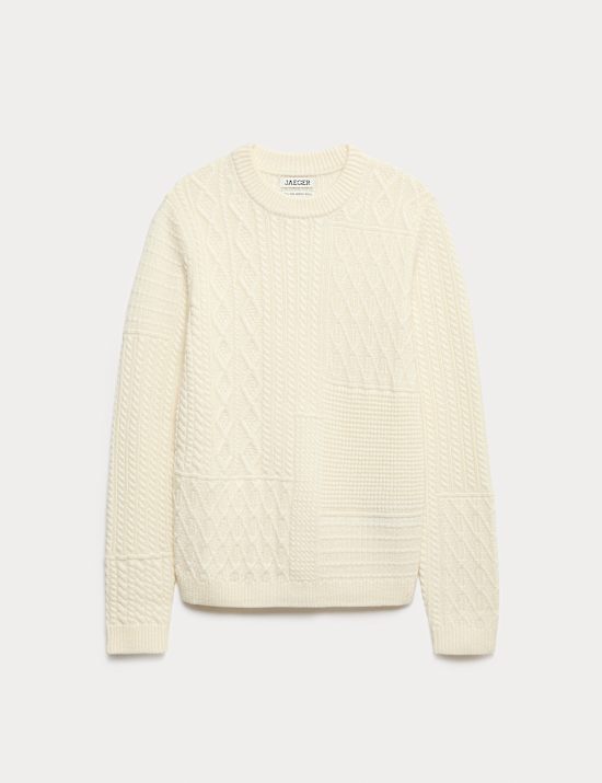 Jersey informal de lana de merino de punto trenzado con dise&ntilde;o de patchwork