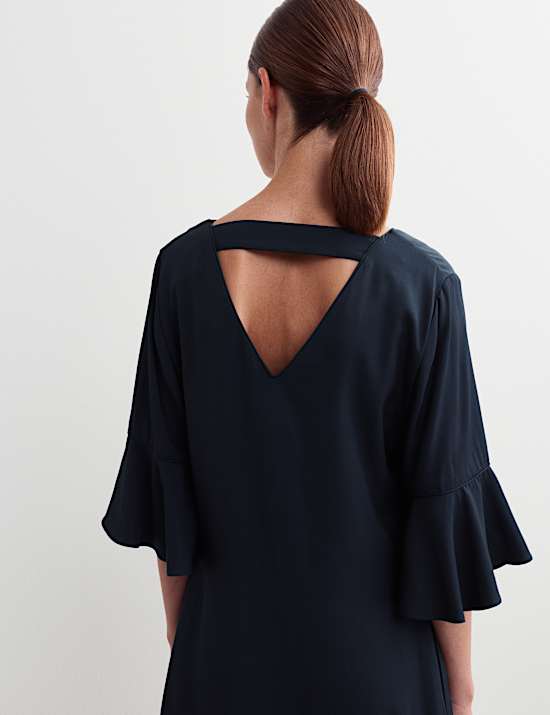 Robe patineuse mi-longue à détail jabot en tweed de cavalerie