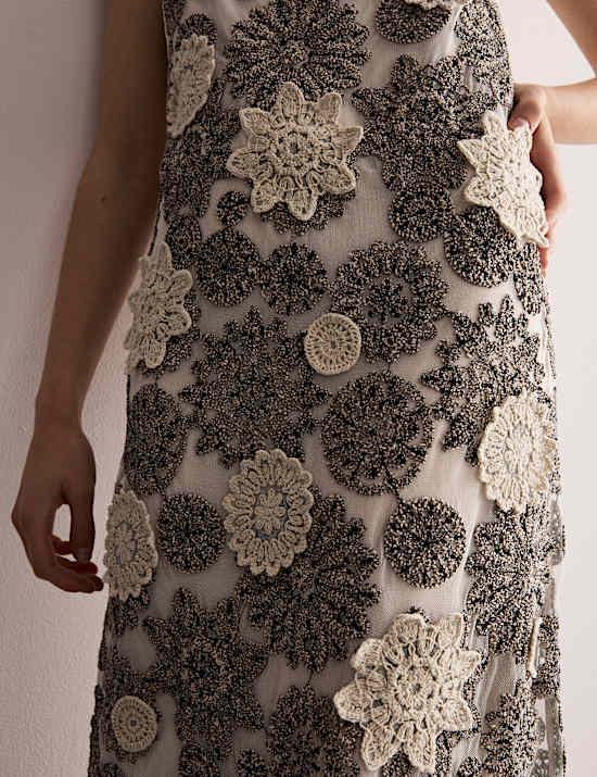 Gebloemde midi-kokerjurk