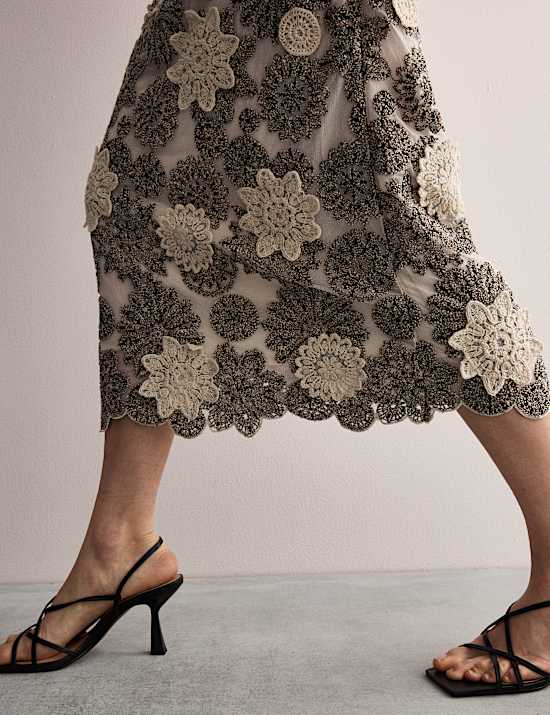 Gebloemde midi-kokerjurk