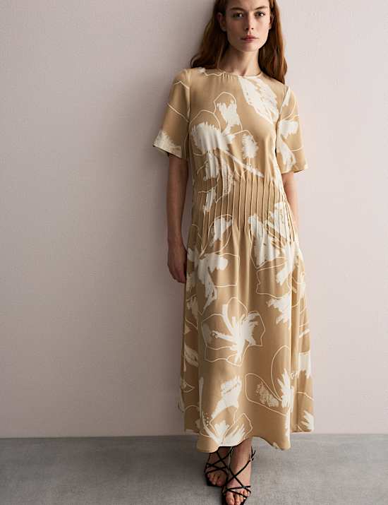 Vestido a media pierna 100 % seda con cintura y estampado floral