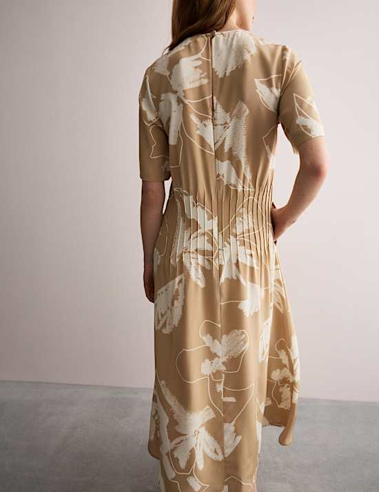 Vestido a media pierna 100 % seda con cintura y estampado floral