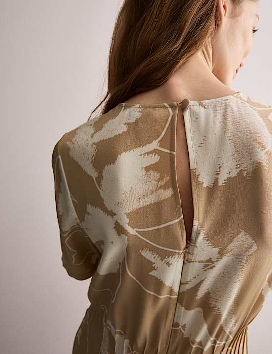 Vestido a media pierna 100 % seda con cintura y estampado floral