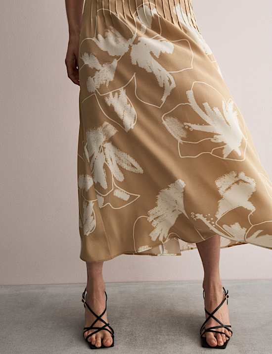 Vestido a media pierna 100 % seda con cintura y estampado floral