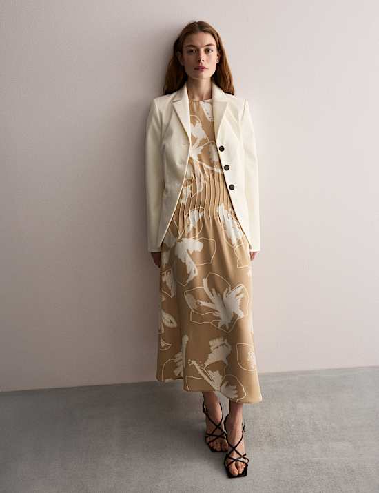 Vestido a media pierna 100 % seda con cintura y estampado floral