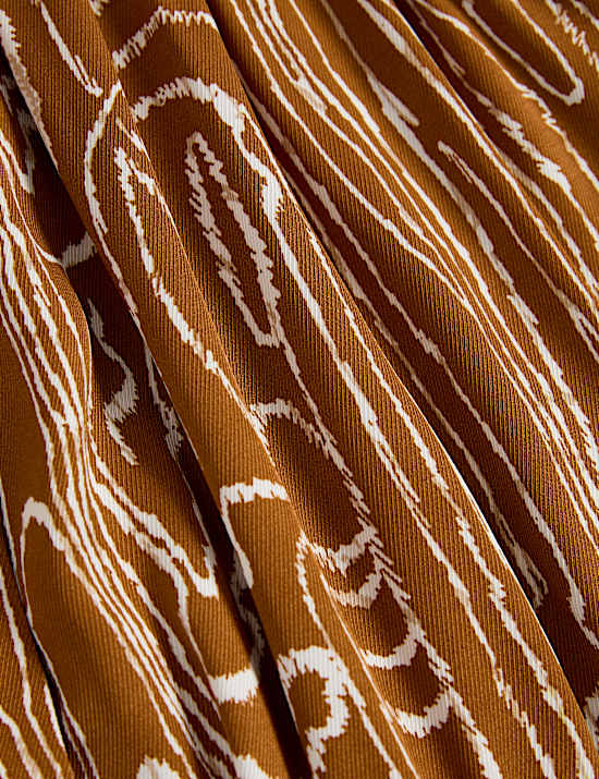 Εμπριμέ μίντι-μάξι μεσάτο φόρεμα