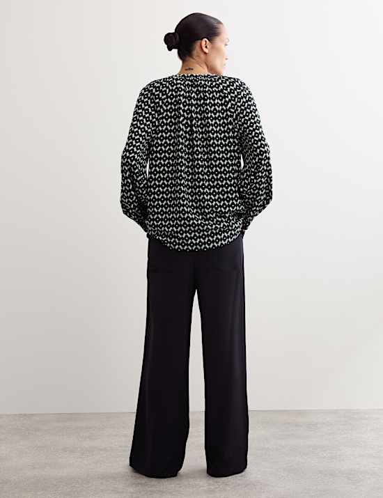 Blouse met knoopsluiting en geometrisch motief