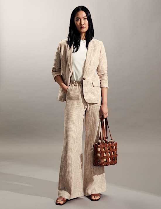 Zuiver linnen blazer met &eacute;&eacute;n rij knopen en groot pied-de-poulemotief