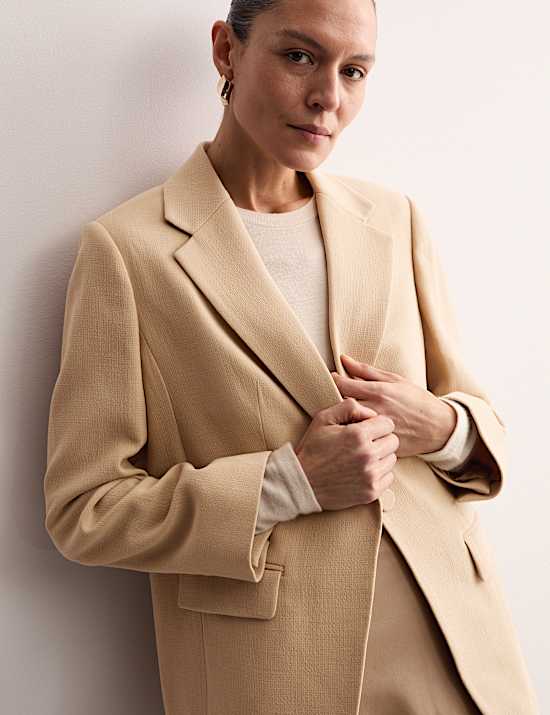 Blazer 100% lana con botonadura de crepé