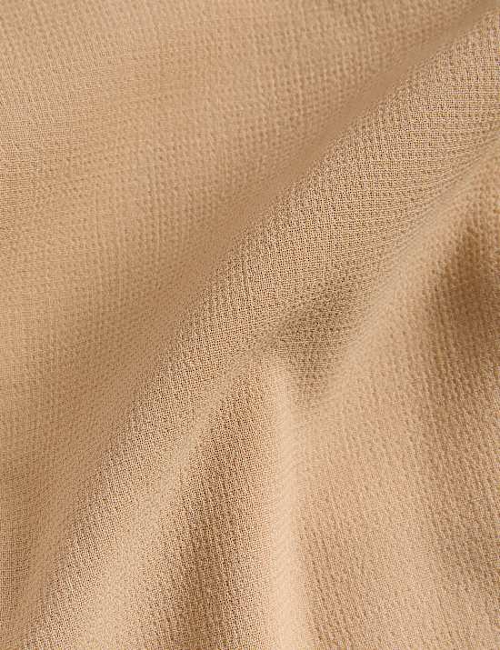 Blazer 100% lana con botonadura de crepé