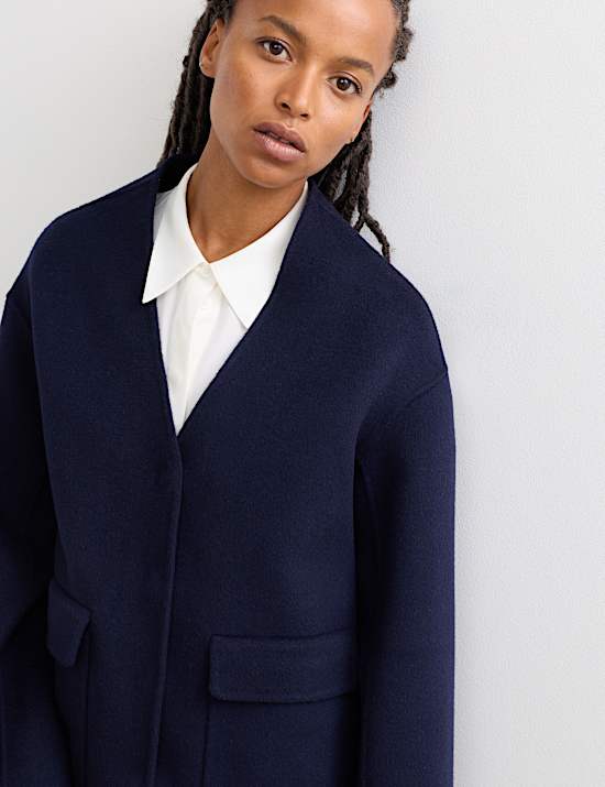 Kort dubbelzijdig jasje van zuiver wol