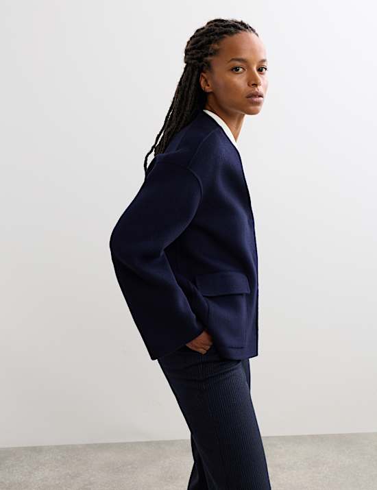 Kort dubbelzijdig jasje van zuiver wol