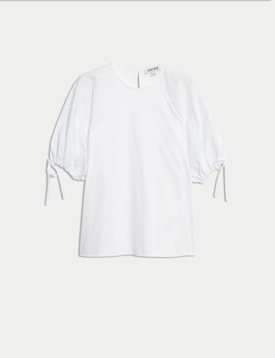 Τοπ σε χαλαρή γραμμή με κλειστή στρογγυλή λαιμόκοψη από 100% βαμβάκι