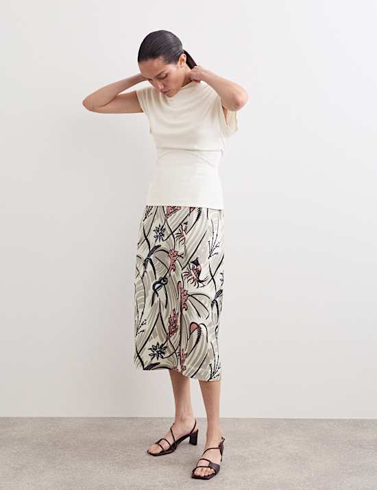 Top z luźnym golfem