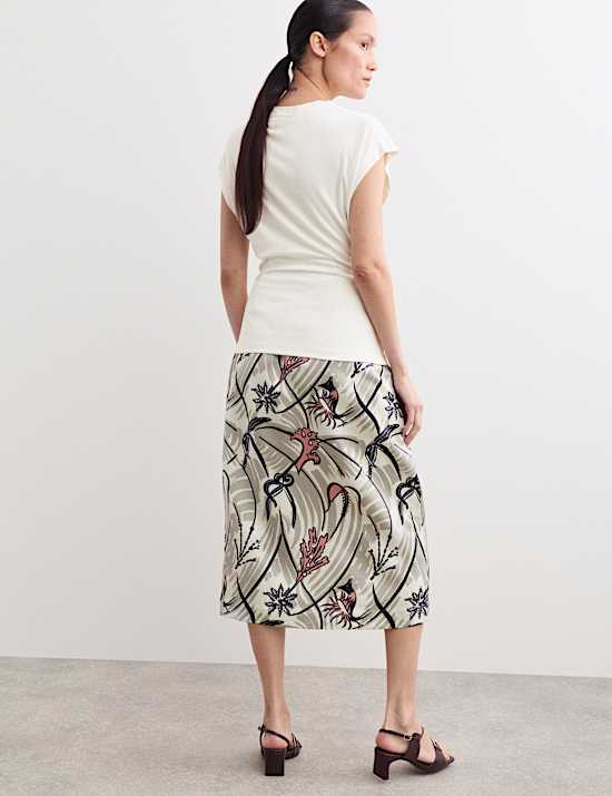 Top z luźnym golfem