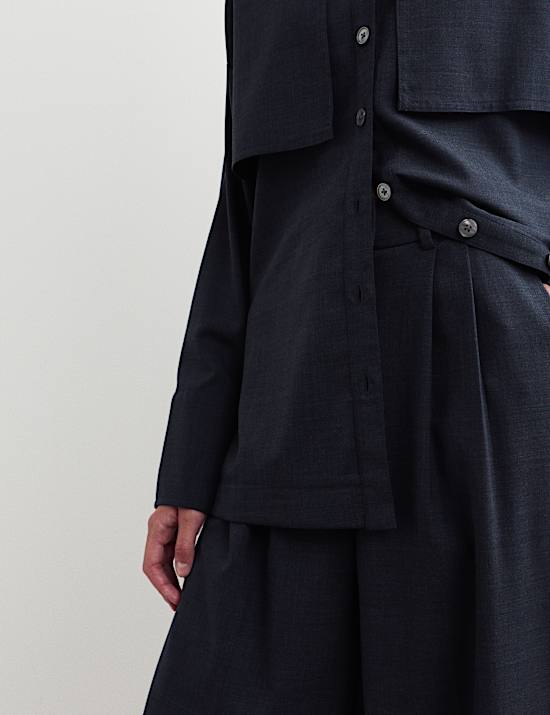 Pantalones de lana de pernera ancha con plisado