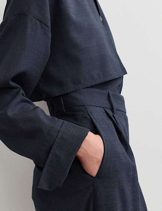 Pantalones de lana de pernera ancha con plisado