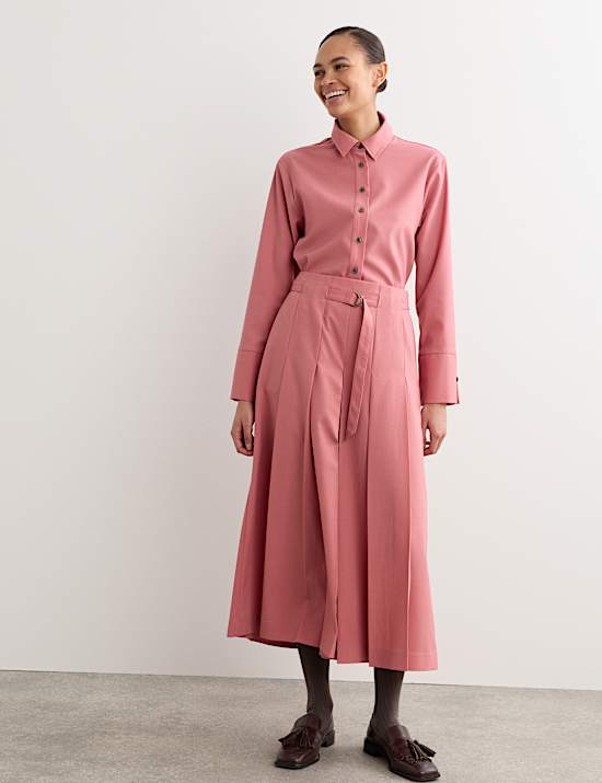 Wolrijke broekrok met wijde pijpen en riem